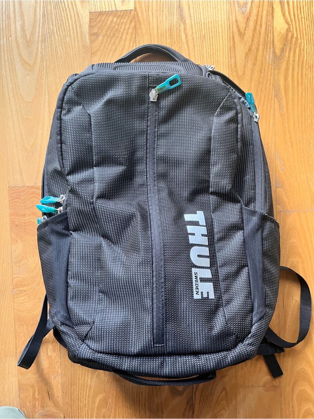 Thule Sweden Black gray Backpack with Teal Zipper Accents like new